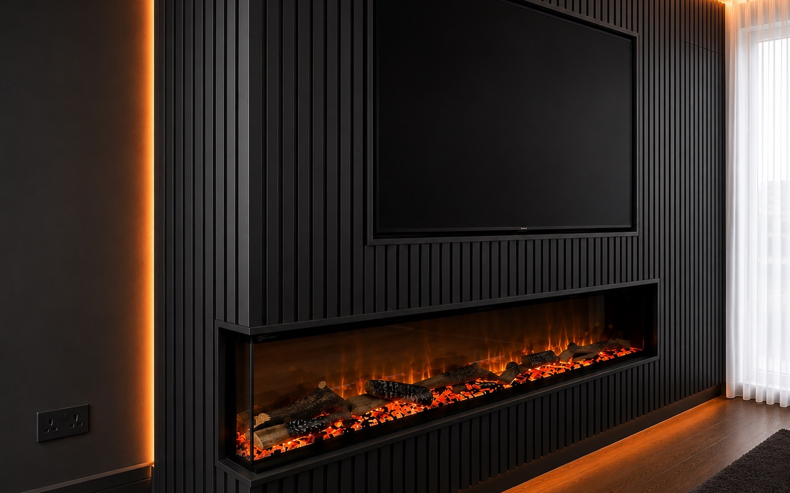 Black slatted media wall with a wall-mounted television, linear fire and warm concealed lighting